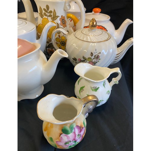 224 - Large selection of assorted tea pots includes Winton, Novelty tea pots etc