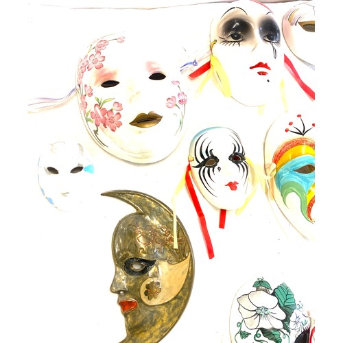 216 - Large selection of assorted decorative face masks includes Metal and Pot