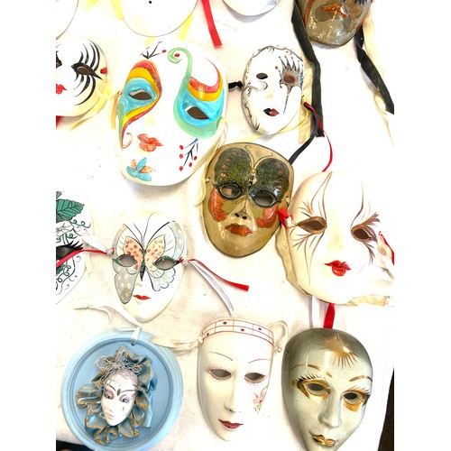 216 - Large selection of assorted decorative face masks includes Metal and Pot