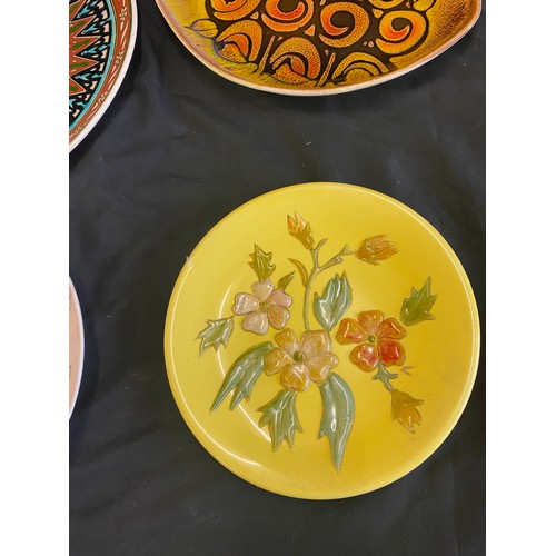 231 - Selection of 4 plates includes Sado, Poole aegean 91, oriental plate, and ozen cini