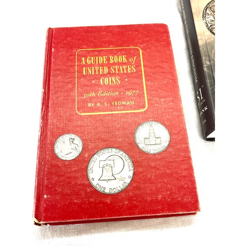 132 - Spinks book of coins and 1 USA coin back