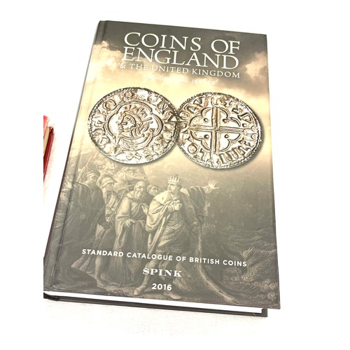 132 - Spinks book of coins and 1 USA coin back