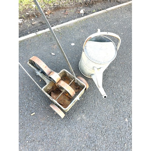 100C - Vintage line painter and watering can