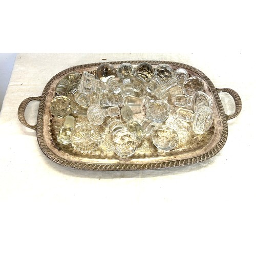 177 - Large silver plated tray and a selection of crystal decanter stoppers