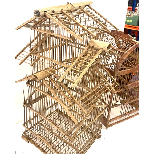 395 - 2 Vintage wooden bird cages, approximate measurements of largest, Height 24 inches, Width 13 inches,... 