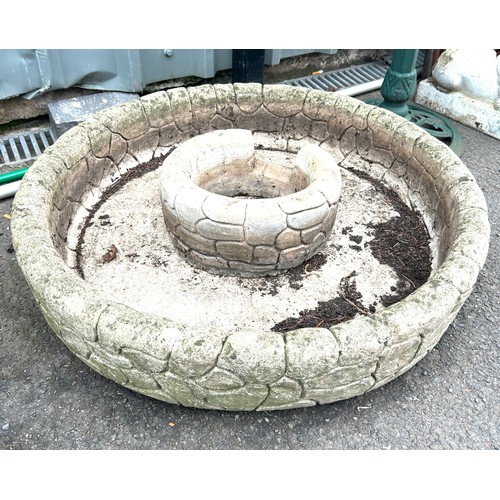 100H - Stone garden feature, approximate diameter 30 inches