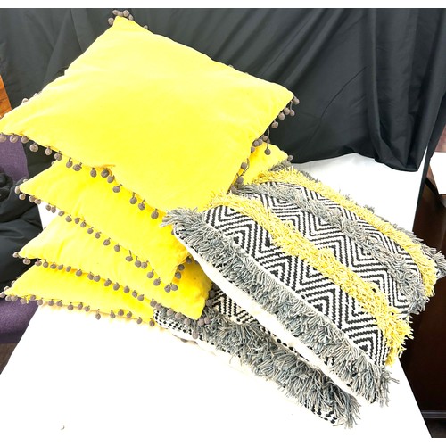 398A - Selection yellow lounge cushions