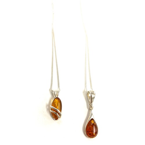 511 - 3 pieces of ladies silver and amber jewellery