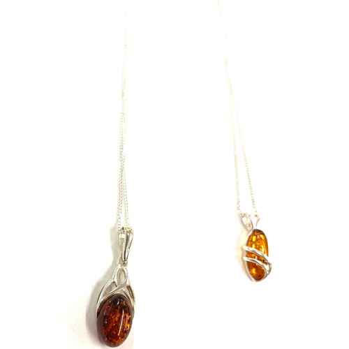 511 - 3 pieces of ladies silver and amber jewellery