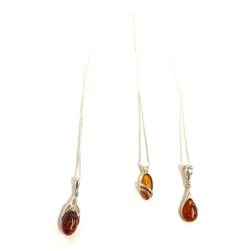 511 - 3 pieces of ladies silver and amber jewellery