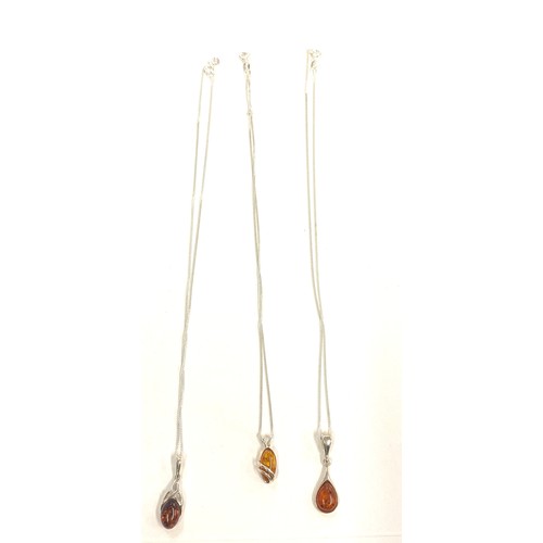 511 - 3 pieces of ladies silver and amber jewellery