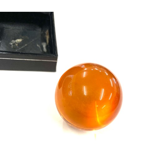 518 - Small amber sphere