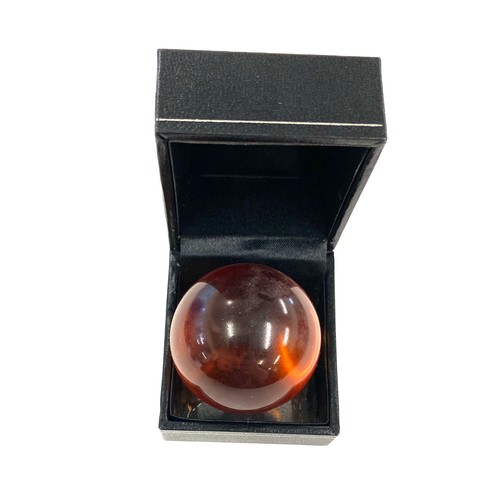 518 - Small amber sphere