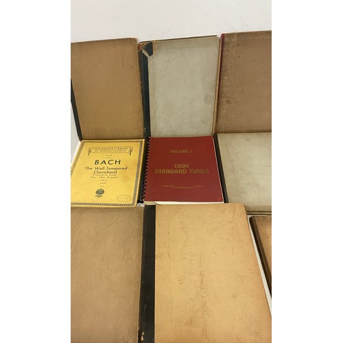 166 - Selection of vintage sheet music and a music stand