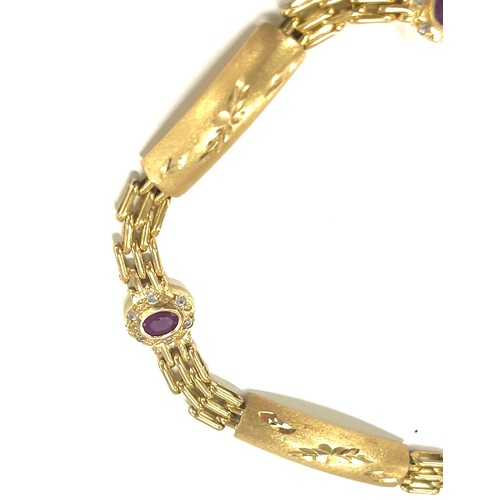 496 - 18ct Gold and ruby ladies bracelet, total weight 10.8grams