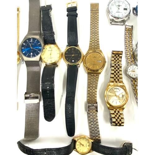 413 - Large selection of ladies and gents wristwatches, all untested