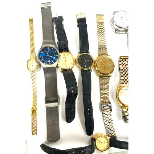 413 - Large selection of ladies and gents wristwatches, all untested