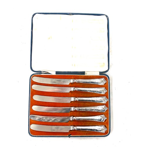 525 - Cased silver handled butter knives, hallmarks worn