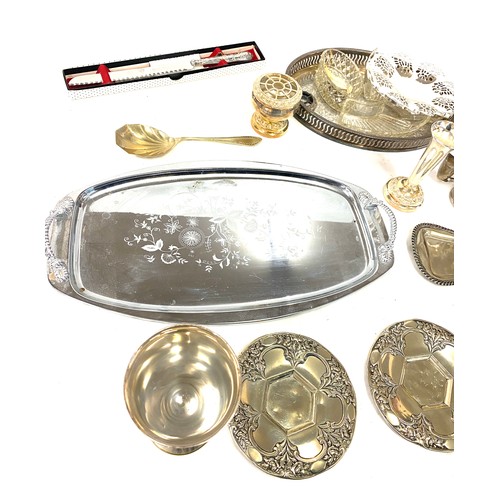 237 - Large selection of silver plated/ metal ware includes a silver handled bread knife etc