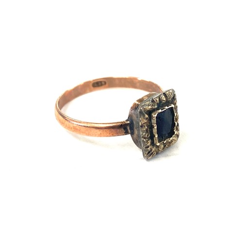 558 - Antique 9ct rose gold ladies ring, set with central stone, possible garnet, UK size O, approximate w... 