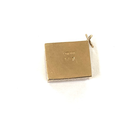 557 - Vintage 9ct ten shilling note charm, approximate weight 2.4g