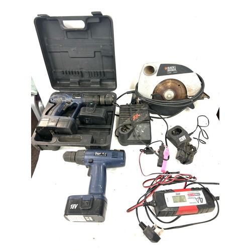 274 - Selection of tools includes Black and decker circle saw, drills, battery charger etc