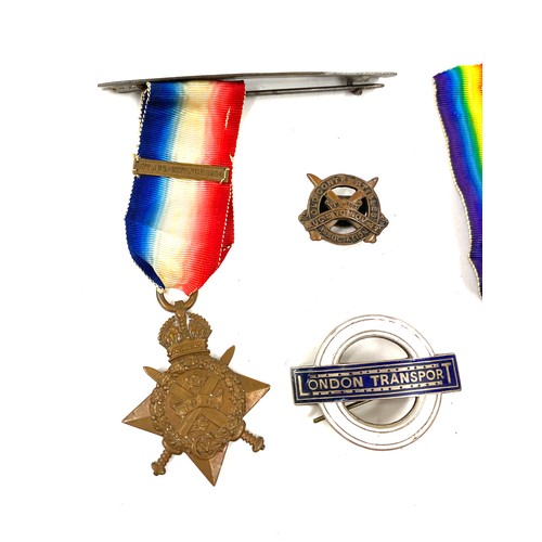 524 - 2 WW1 Medals named DVR.R.Millington 54938 and SJT.R.Millington plus a enamel London transport badge ... 