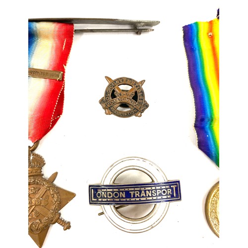 524 - 2 WW1 Medals named DVR.R.Millington 54938 and SJT.R.Millington plus a enamel London transport badge ... 