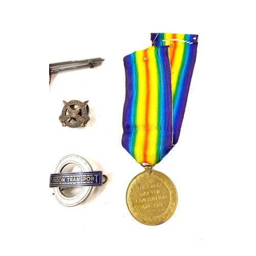 524 - 2 WW1 Medals named DVR.R.Millington 54938 and SJT.R.Millington plus a enamel London transport badge ... 