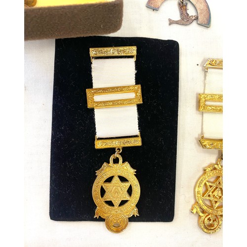 157 - 2 Masonic cases with a large selection of masonic aprons, jewels, ropes, silver and enamel cufflinks... 