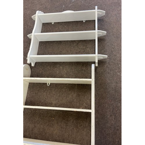 574 - Pair of painted wall hanging shelving units, largest measures approx 27 inches tall 25 inches wide