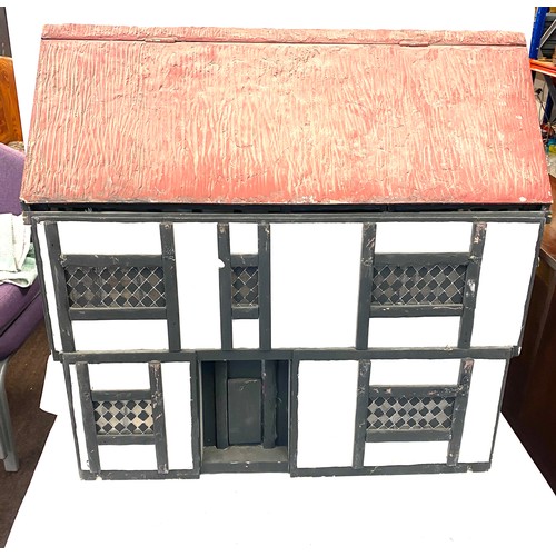 229 - Large vintage dolls house in mock Tudor style, roof opens out and front elevation is removeable