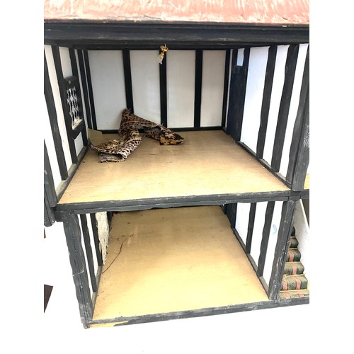 229 - Large vintage dolls house in mock Tudor style, roof opens out and front elevation is removeable