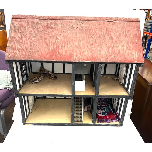 229 - Large vintage dolls house in mock Tudor style, roof opens out and front elevation is removeable