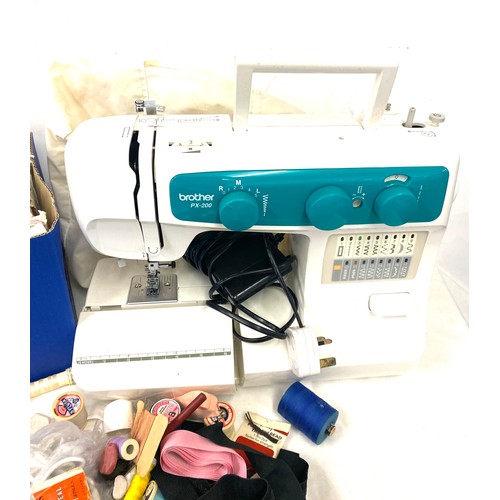 275 - Brother PX-200 sewing machine, a wicker basket of sewing contents and a box of vintage Vogue Simplic... 