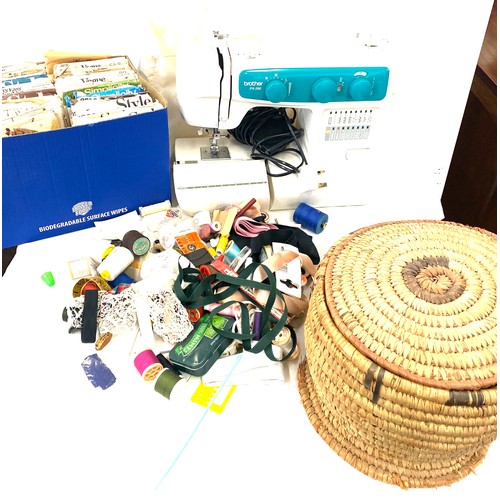 275 - Brother PX-200 sewing machine, a wicker basket of sewing contents and a box of vintage Vogue Simplic... 