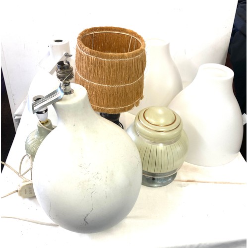 245 - Large selection of assorted lamps and a selection of shades, all untested