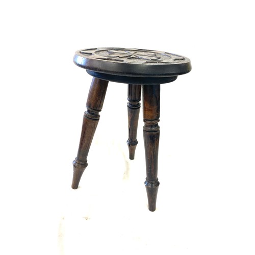 347 - Oak carved 3 legged stool measures approx 13 inches tall 9 inches diameter