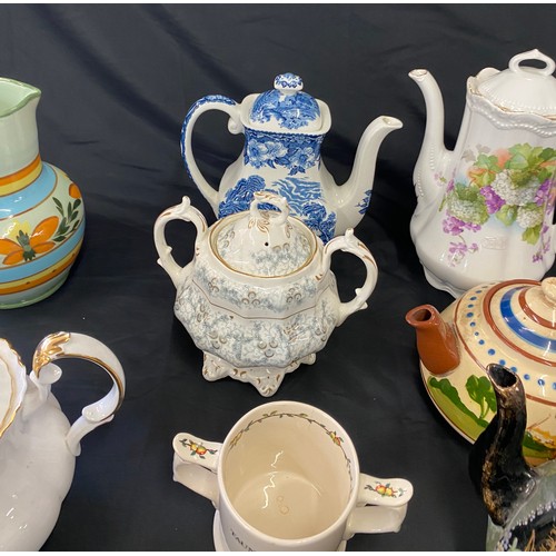 314 - Large selection of vintage and later Tea pots, Vases, Jugs etc