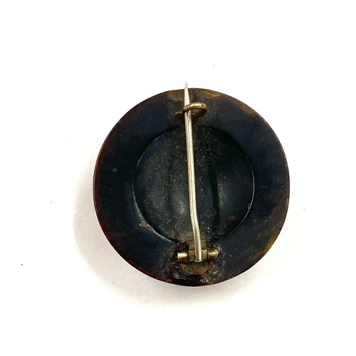 404 - Victorian tortoiseshell pique brooch, approximate diameter 3cm