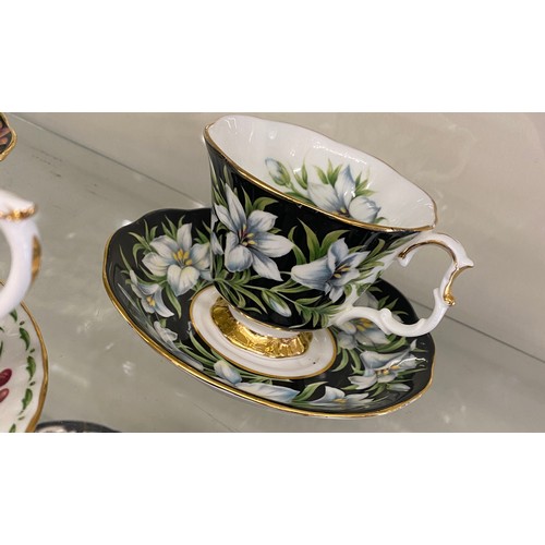 381 - Three Royal Albert cups and saucers includes Christmas Rose and Provinical Flowers