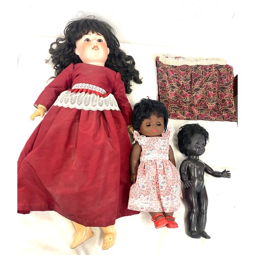 215 - Three vintage and later dolls