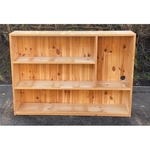 635 - Pine bookcase measures approx 36.5 inches tall 51 inches wide 10.5 inches