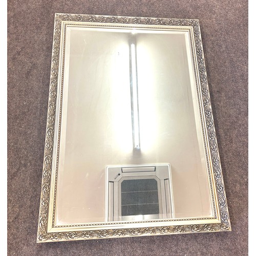 206 - Vintage bevelled edge mirror measures approx 39inches tall 27 inches wide