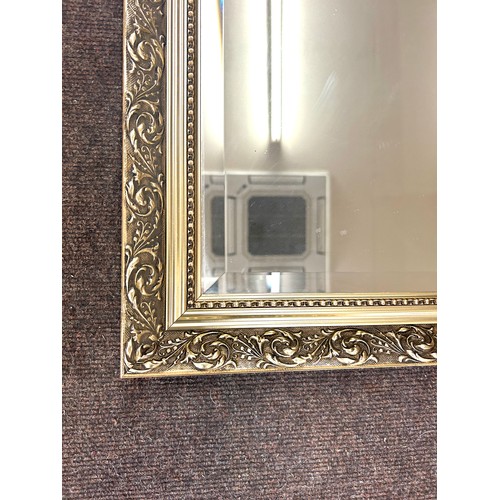 206 - Vintage bevelled edge mirror measures approx 39inches tall 27 inches wide