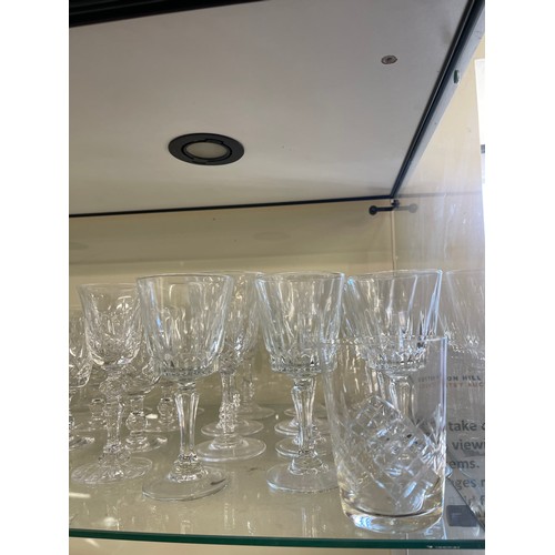 380 - Large selection of vintage and late cut glass includes jug, brandy glasses etc