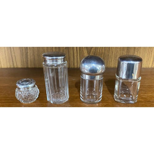 432 - 4 vintage Silver top jars