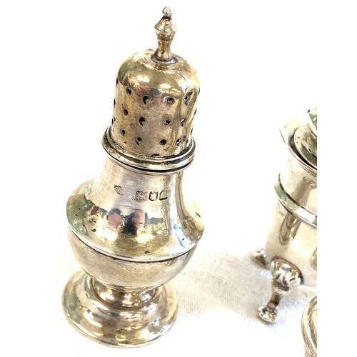 463 - 3 Hallmarked pepper pots and 1 salt