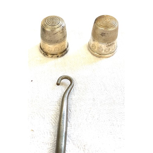 439 - 3 Silver hallmarked thimbles and a hallmarked button hook