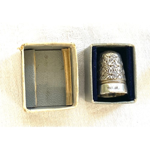 439 - 3 Silver hallmarked thimbles and a hallmarked button hook